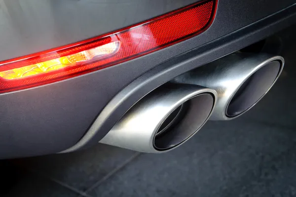 Close up of a car dual exhaust pipe Stock Photo