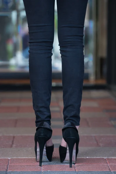 Black High Heels on Paver Block — Stock Photo, Image