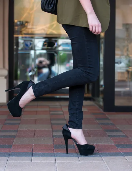 High heels on paver blocks — Stock Photo, Image