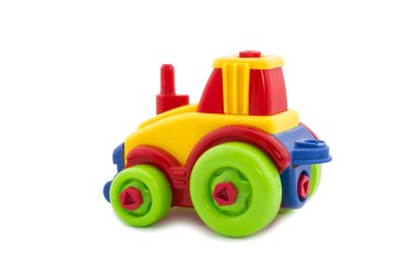 oyuncak plastik çocuk odası, parlak tonları bir traktör.