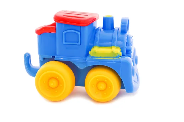 Toy a plastic nursery, a steam locomotive of bright shades. — Stock Photo, Image