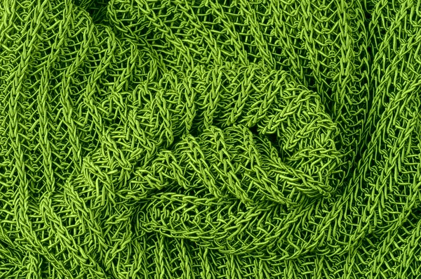 Nahaufnahme grüner Strickpullover Hintergrund — Stockfoto