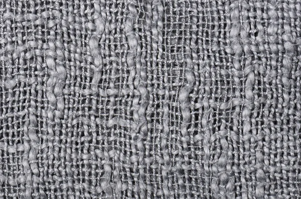 Gri örgü kazak arkaplanını kapat