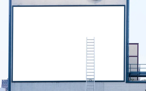 Empty billboard with ladder — Stock Photo, Image