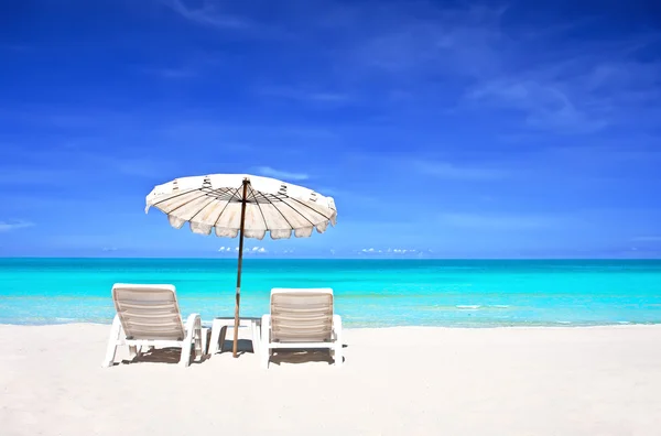 Beach chairs with umbrella — Stock Photo, Image