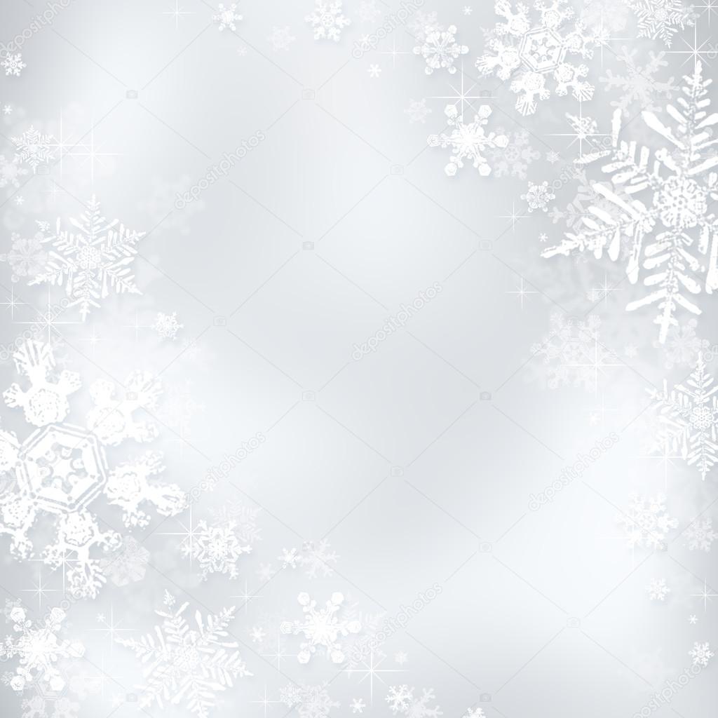 Decorative blue christmas background with bokeh lights and snowflakes