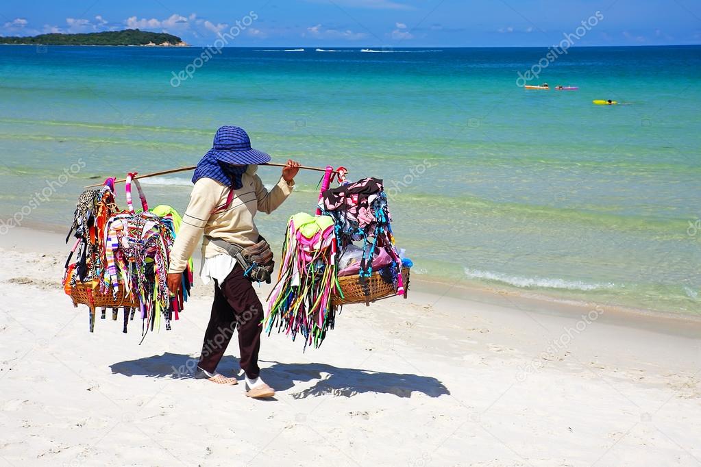 Thai woman selling beachwear at beach in Koh Samui, Thailand. 