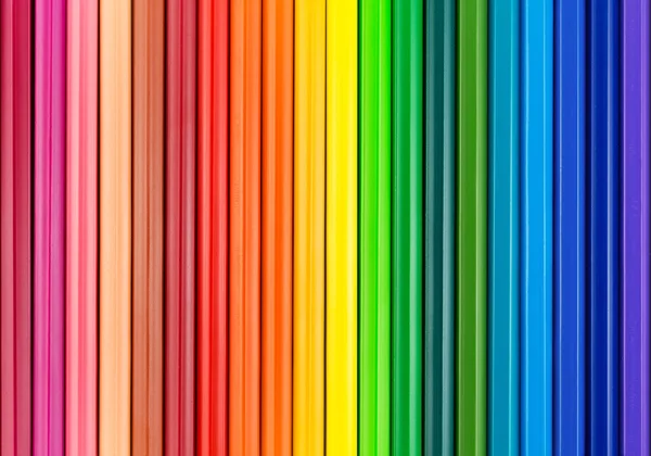 Kleurrijke achtergrond met kleurpotloden — Stockfoto