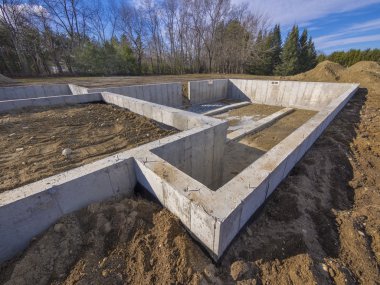 Concrete foundation for a new house clipart