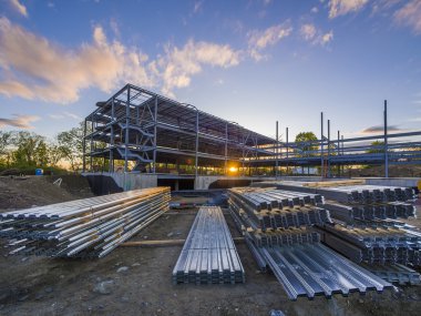 Construction site for commercial building at sunset