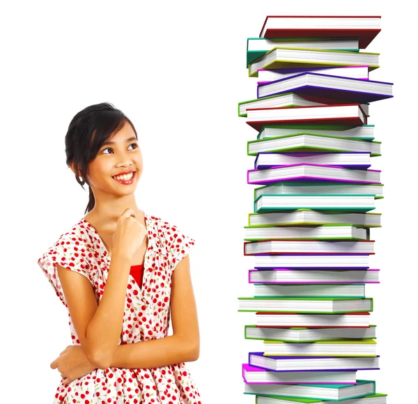 Joven estudiante sonriendo en libros para leer —  Fotos de Stock