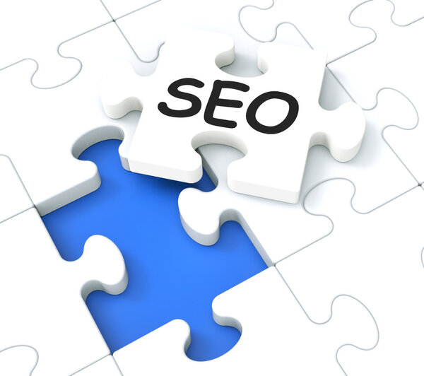 SEO Puzzle Showing E-Marketing and Promotions
