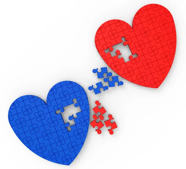 Dvě srdce puzzle ukazuje zásnubní a svatební — Stock fotografie