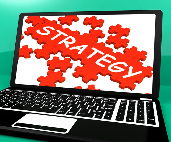 Strategy Puzzle On Notebook Showing Online Solutions — Stock Photo, Image