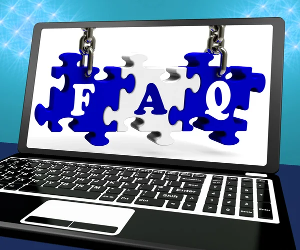 FAQ puzzel op laptop toont website hulp — Stockfoto