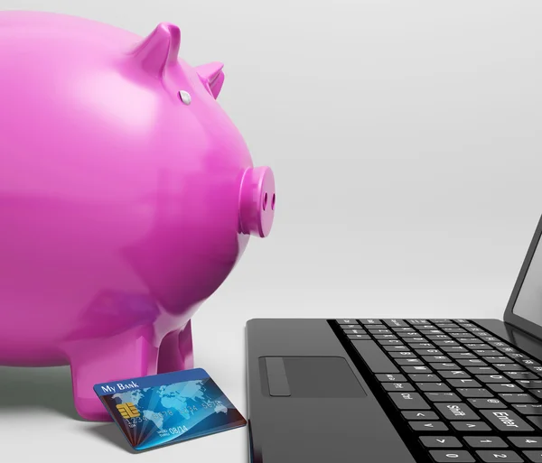Piggy en la computadora muestra ahorro en línea — Foto de Stock