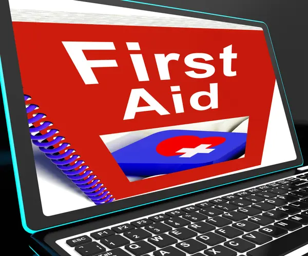 First Aid On Laptop Shows Medical Assistance — Stock Photo, Image