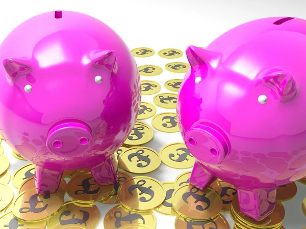 Piggybanks On Pound Coins Shows Wealthy Savings — Stock Photo, Image