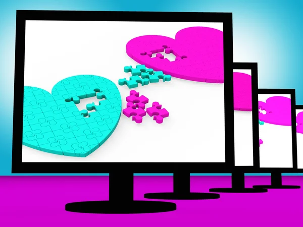 Two Hearts On Monitors Showing Celebrities "Romances — стоковое фото