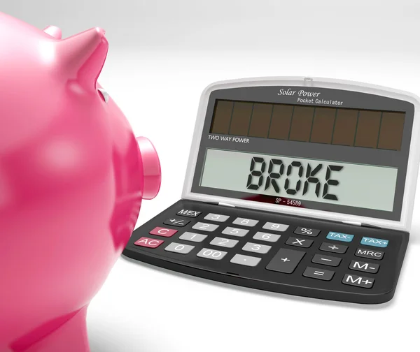 Broke Calculator viser finansielle problemer og fattigdom - Stock-foto