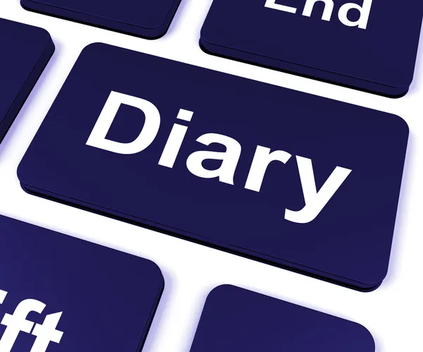 A chave do diário mostra o planejador ou a programação em linha — Fotografia de Stock