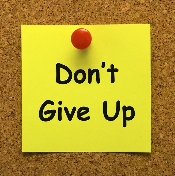 Não desista da nota significa nunca desistir — Fotografia de Stock