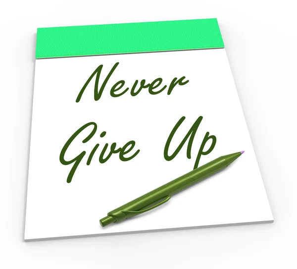 Never Give Up Notepad Means Perseverance and No Quitting — стоковое фото