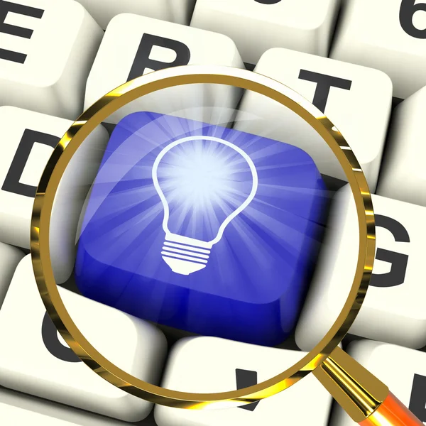 Light bulb Key Magnified Means Bright Idea Innovation Or Inventi — Stock Photo, Image