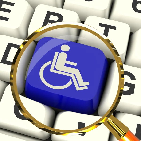 Disabled Key Magnified Shows Wheelchair Access Or Handicapped — Stock Photo, Image