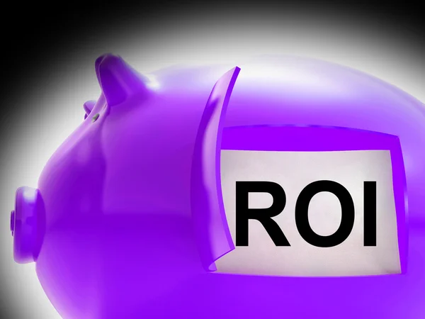 ROI piggy bank monety pokazuje zwrot z inwestycji — Zdjęcie stockowe