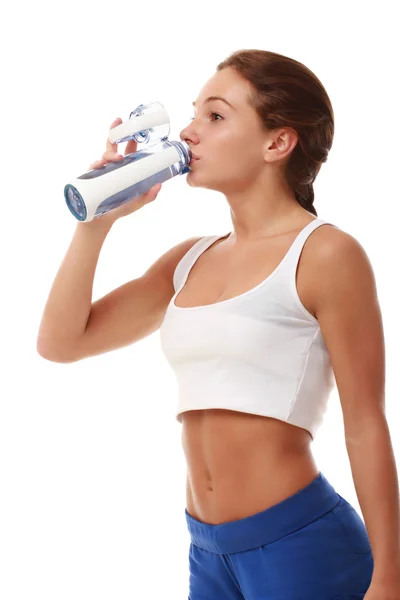 Young attractive fitness model drinking — Stock Photo, Image