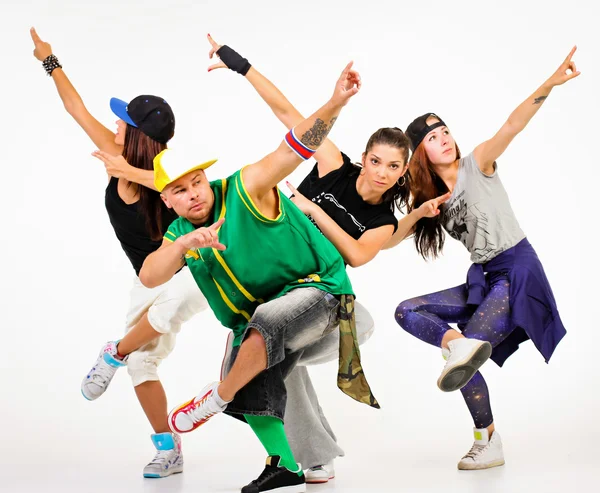 Grupp ungdomar i hip hop kläder Stockbild