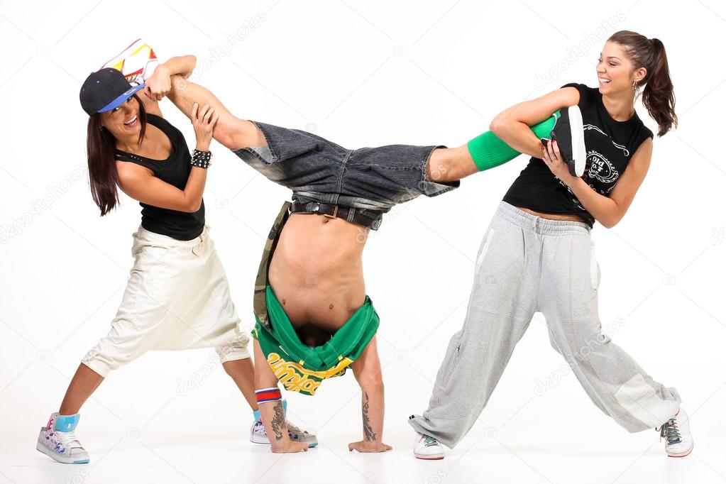 Two woman making fun over the hip hop man
