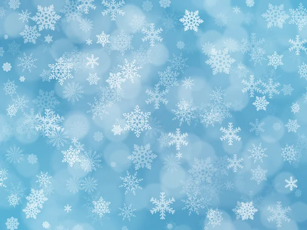 Fondo azul invierno con copos de nieve y efecto boke —  Fotos de Stock