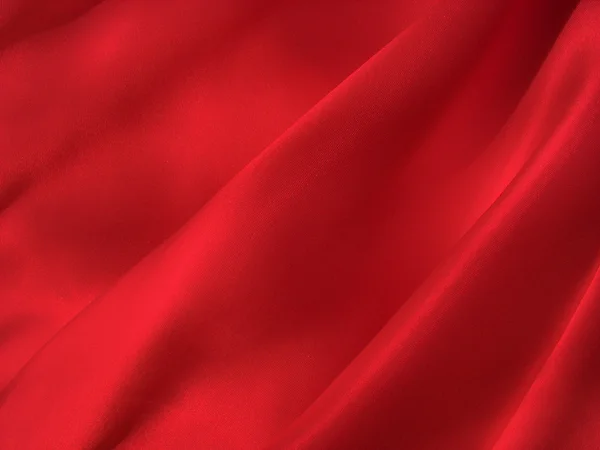 Folded scarlet silk background — Stock Photo, Image