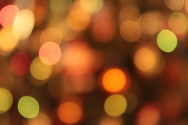 Fundo multicolorido festivo com efeito bokeh — Fotografia de Stock