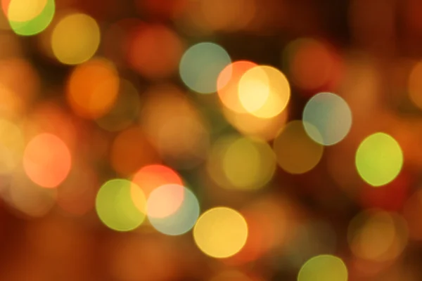 Fundo multicolorido festivo com efeito bokeh — Fotografia de Stock