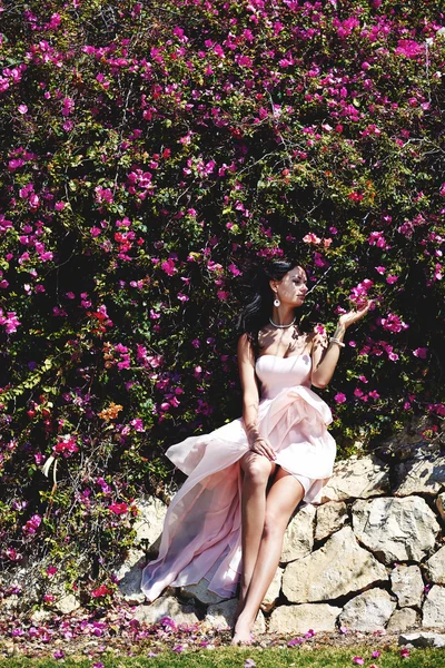 Pink flowers and girl — Stock Photo, Image