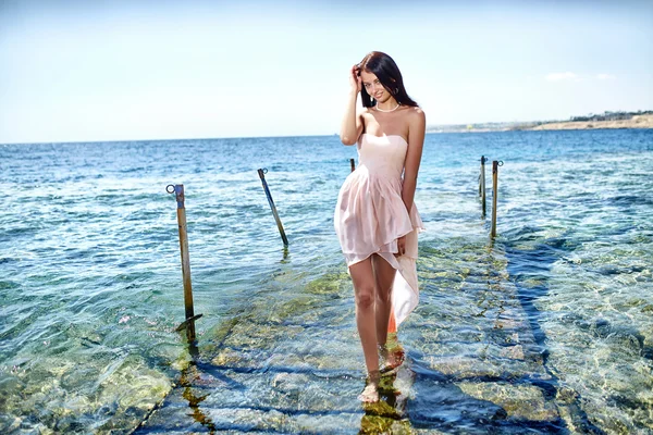 Mädchen und Meer Stockbild