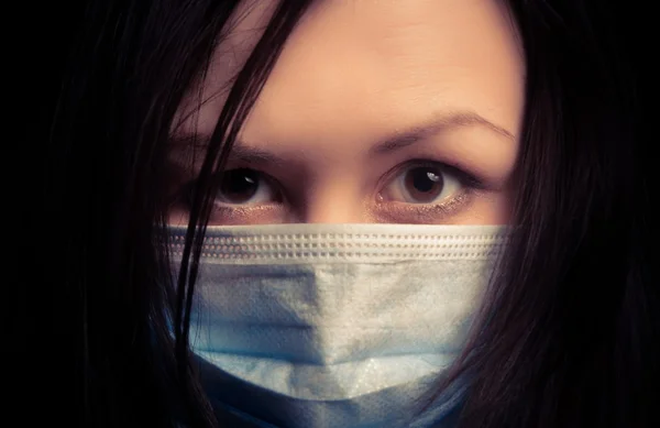 Girl in protective mask — Stock Photo, Image