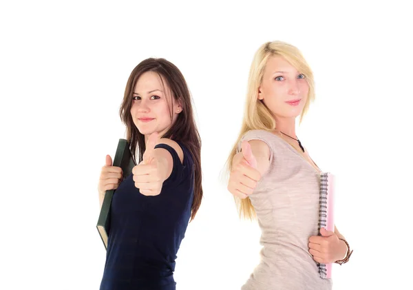 Two beautiful student girls showing thumbs up — Stock Photo, Image