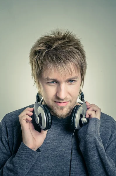 Young man with headphones — Stock Photo, Image