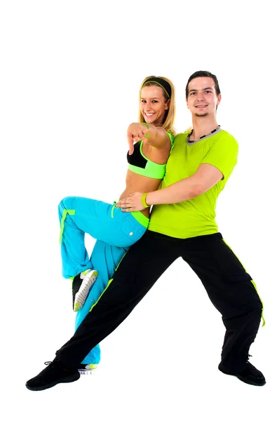 Acrobatic dancing with two young trainers — Stock Photo, Image