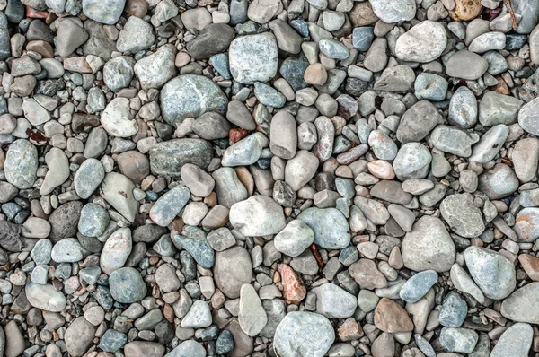 Pebble stenen close-up op de oever — Stockfoto