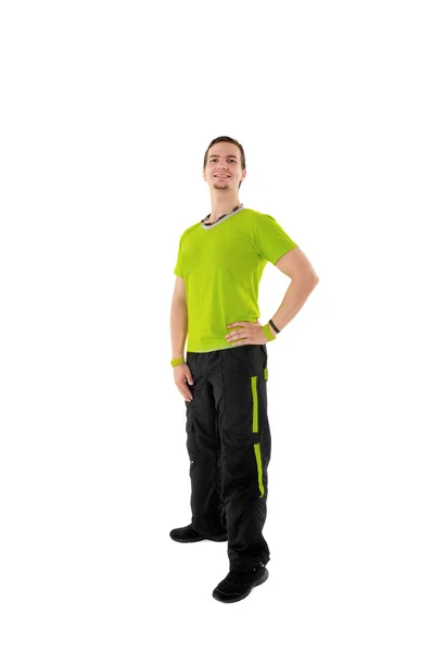 Unga manliga fitness instruktör på vit isolerade bakgrund — Stockfoto