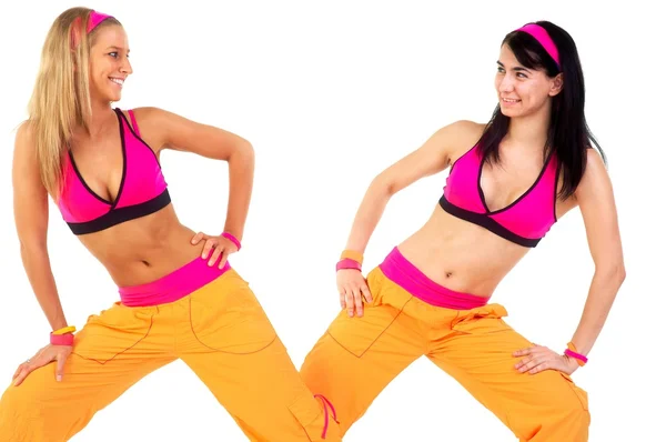 Young fitness instructors against white background — Stock Photo, Image