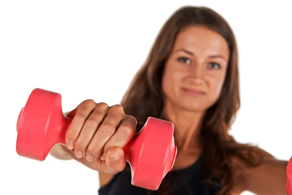 Genç bir kadının ellerinde ağırlıkları — Stok fotoğraf