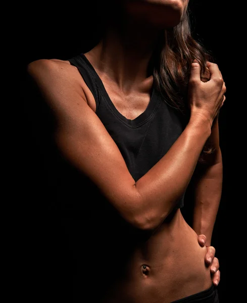 Muscular fitness instructor in a studio — Stock Photo, Image