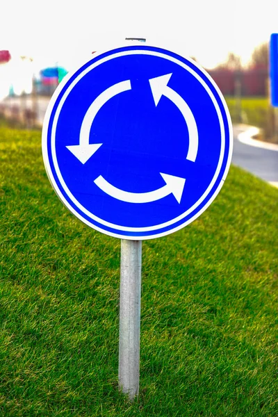 Circular junction road sign — Stock Photo, Image