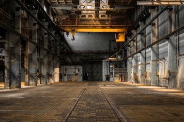 Industrial interior of an old factory clipart